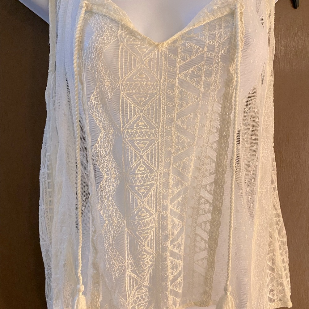Completely sheer, awesome print, V-neck with strings